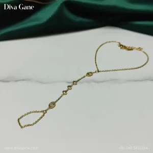 elegant gold hand chain with crystal detailing