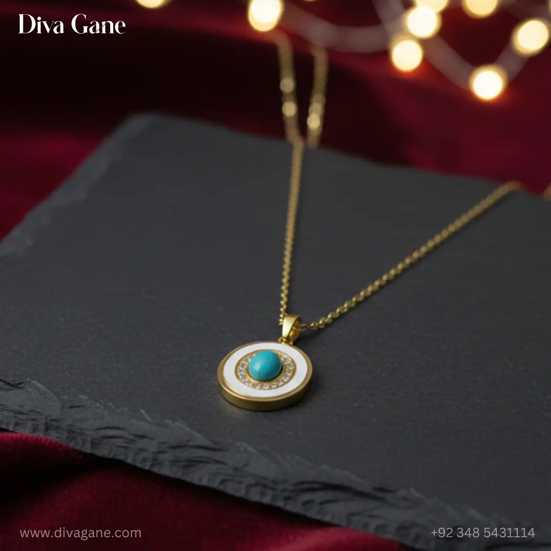 celestial turquoise evil eye medallion – white enamel & gold Luxury gold pendant necklace with a turquoise stone and white enamel finish, perfect for layering, shown with soft bokeh lighting