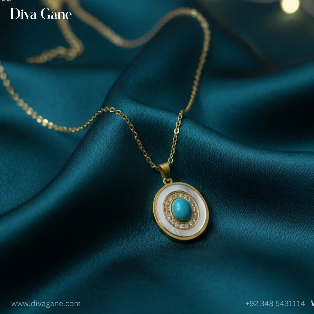 celestial turquoise evil eye medallion – white enamel & gold Detailed close-up of a gold-toned medallion pendant featuring a vibrant blue turquoise center stone and intricate white enamel inlay